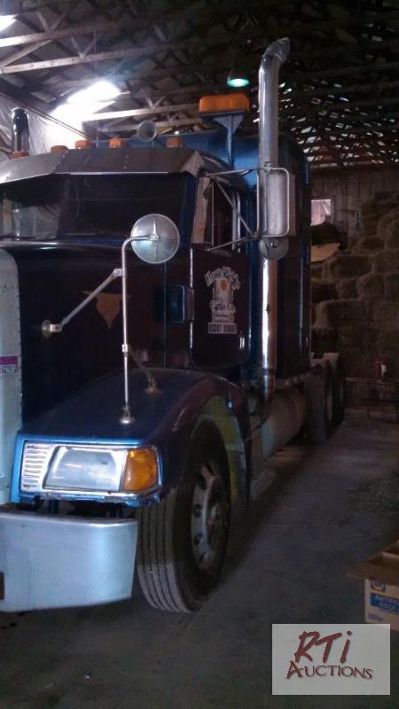 lot 2 image: 1996 Peterbilt 377 road tractor, 60 inch slee...