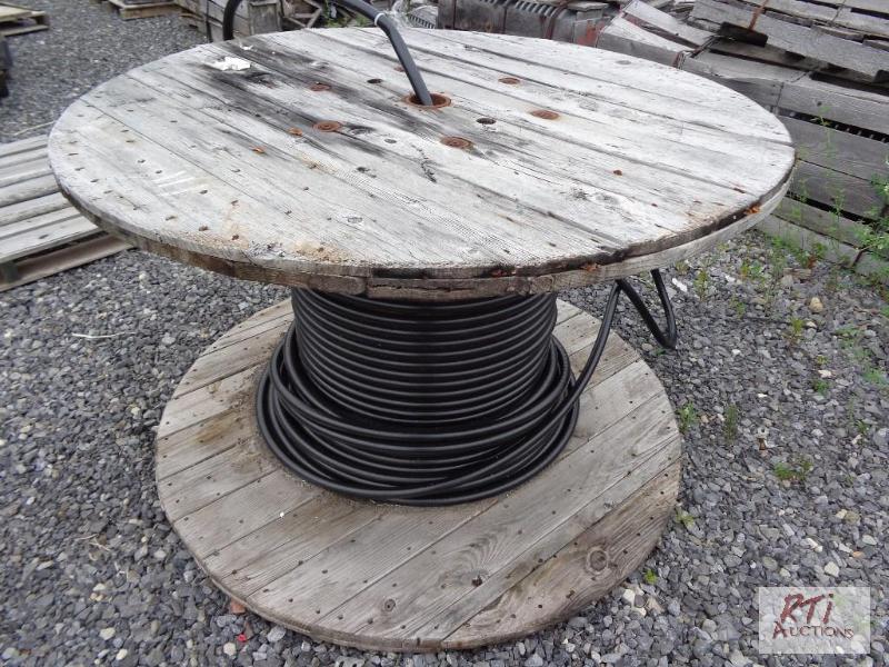 lot 111 image: Partial spool of flex conduit...