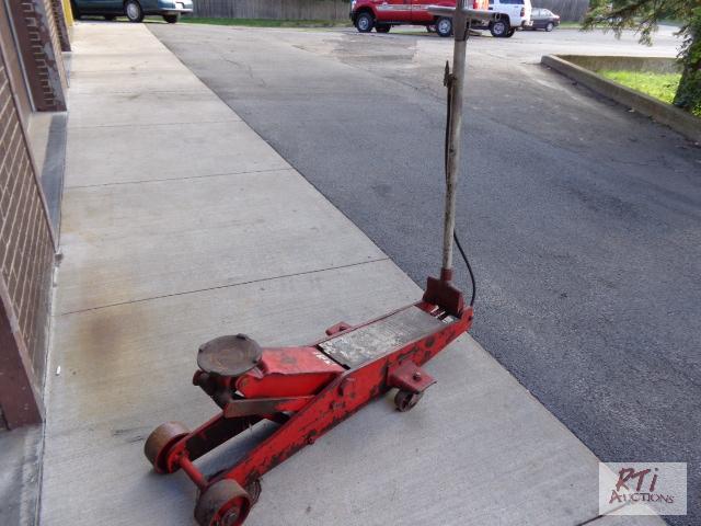 lot 1 image: (2) Shop Hydraulic Floor Jacks. Item sold AS ...