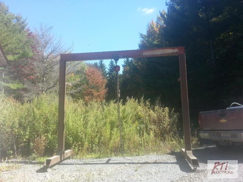 lot 106 image: A frame with 3 ton chain fall and trolly, 12f...