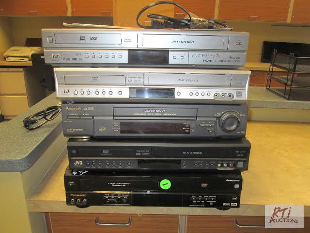 lot 123 image: (2) Panasonic (3) JVC VHSDVD players, workin...