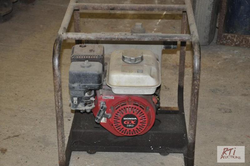 lot 64 image: 2005 HondaStone 2in. Trash pump wcarry cage...