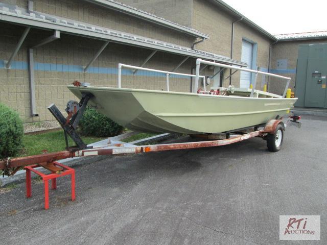 lot 12 image: 1990 Jon boat with trailer, 17ft, no engine. ...