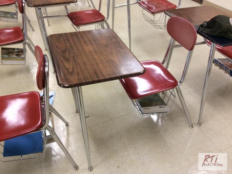 lot 68 image: (130) One piece student desks with connected ...