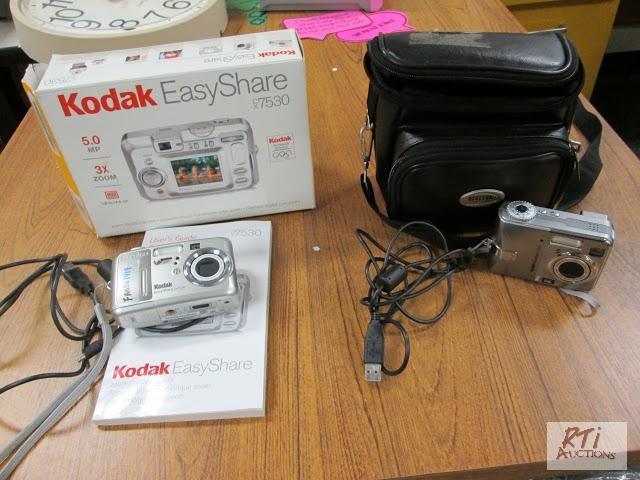 lot 103 image: (2) Easy Share digital cameras, CX 7530, C340...