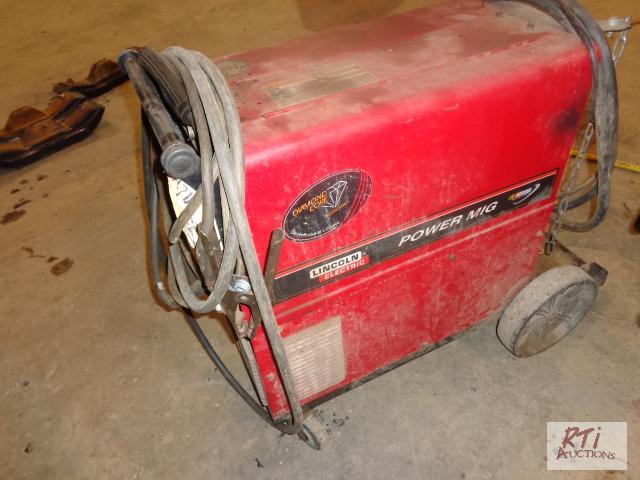 lot 49 image: Lincoln Power Mig 255 Welder wleed and hose....