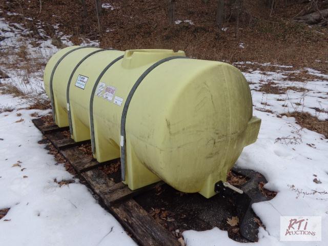 lot 66 image: 1000 Gallon Poly Tank wvalve. Tank needs to ...
