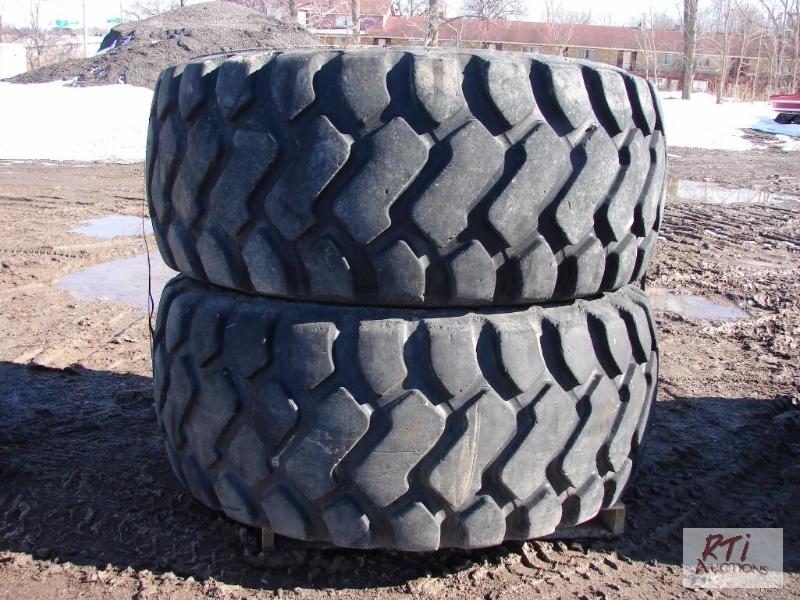 lot 50 image: (2) Michelin 29.5-25 Radial Tires 75% tread w...