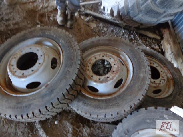 lot 52 image: (3) 22570R19.5 Tires on 10 hole rims. As-is,...