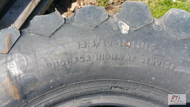lot 53 image: 2 each 12.58018 NHS tires Sold AS-IS. Locat...