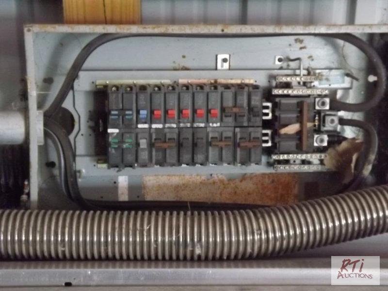 lot 39 image: Three phase electrical service panel with ris...