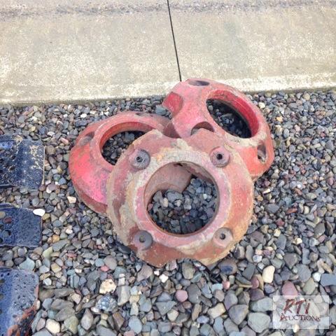lot 50 image: (3) Tractor wheel weights, approximately 134 ...