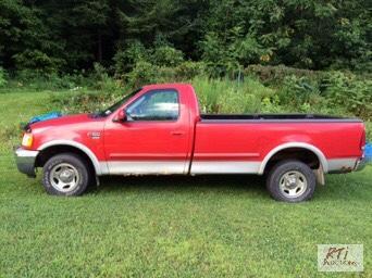 lot 7 image: 1999 Ford F-150 XLT VIN 2FTRF18W9XCA82320, 4...
