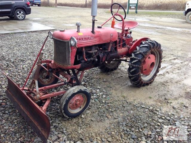 lot 28 image: 1953 Farmall Cub with a 62 inch snow blade, s...