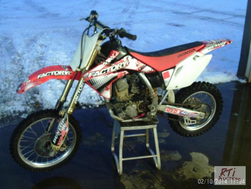 lot 24 image: 2008 Honda CRF150R Motocross dirt bike. 4 str...