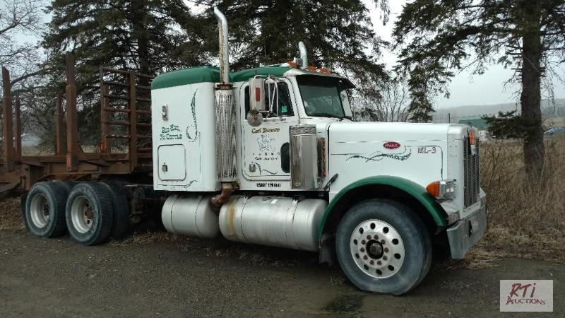 lot 3 image: 1999 Peterbuilt Sleeper Cab Tractor. VIN1XP5...