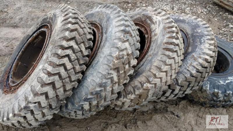 lot 50 image: (4) 9.00x10.00 tires on open rims.&nbspAll i...