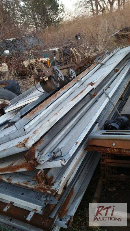 lot 164 image: Large quantity of used garage door panels and...