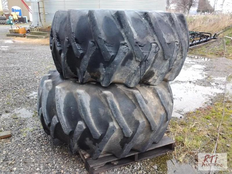 lot 170 image: (2) 28L x 26 tires and wheels, about 50% trea...