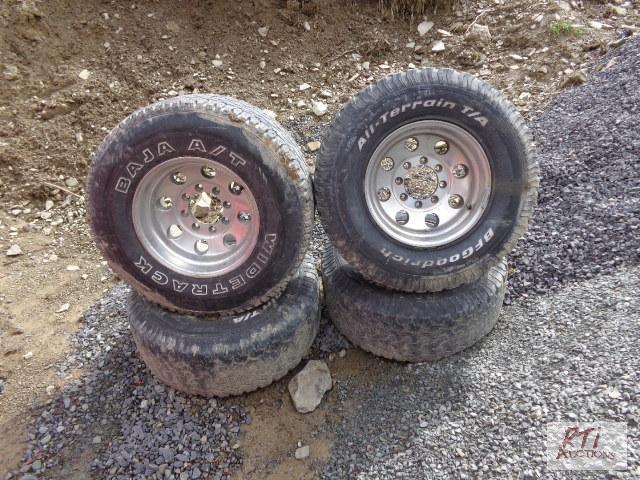 lot 174 image: (4) 16.5&quot Aluminum 10 stud hole rims and...