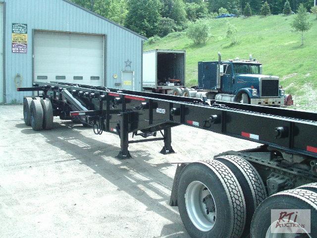 lot 30 image: 1991 Clement double-hydraulic roll-off traile...