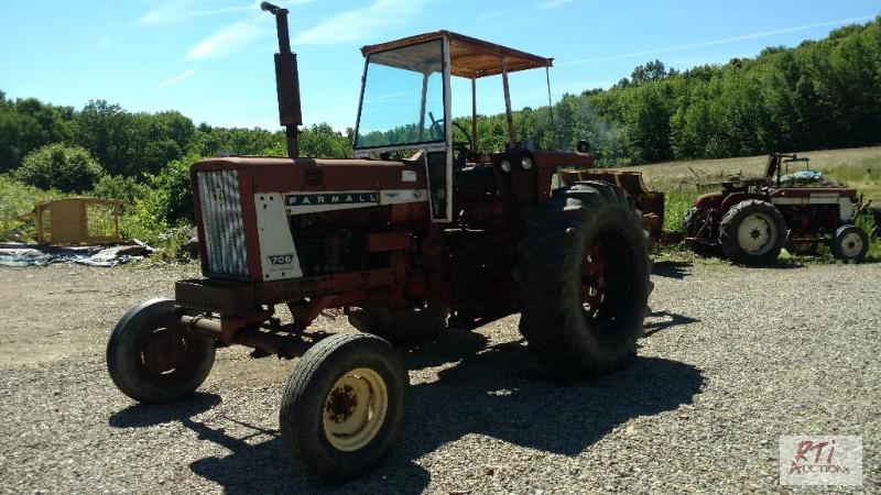 lot 35 image: Tractor and plow combination. International F...