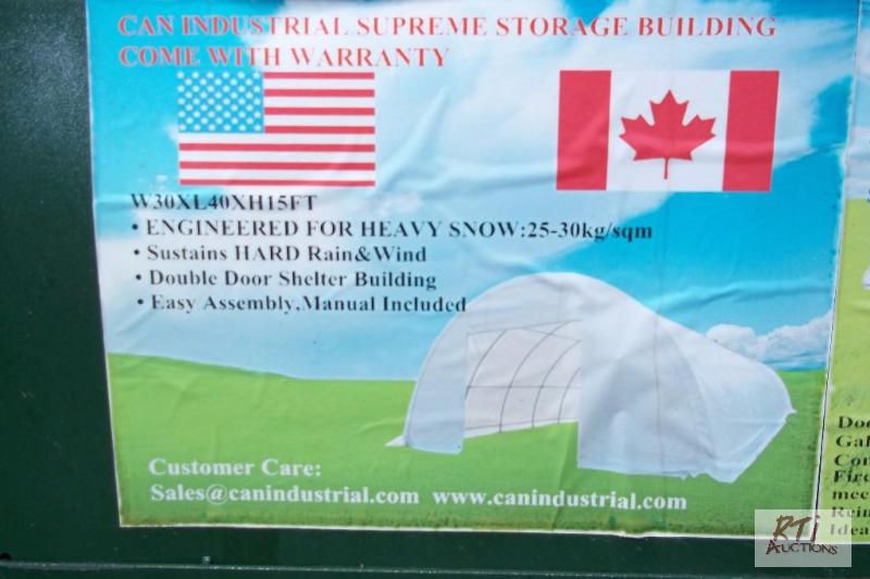 lot 63 image: 30X40X15 storage building, new in box. Locate...