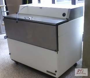 lot 74 image: TRUE lift front milk cooler, single door, hol...
