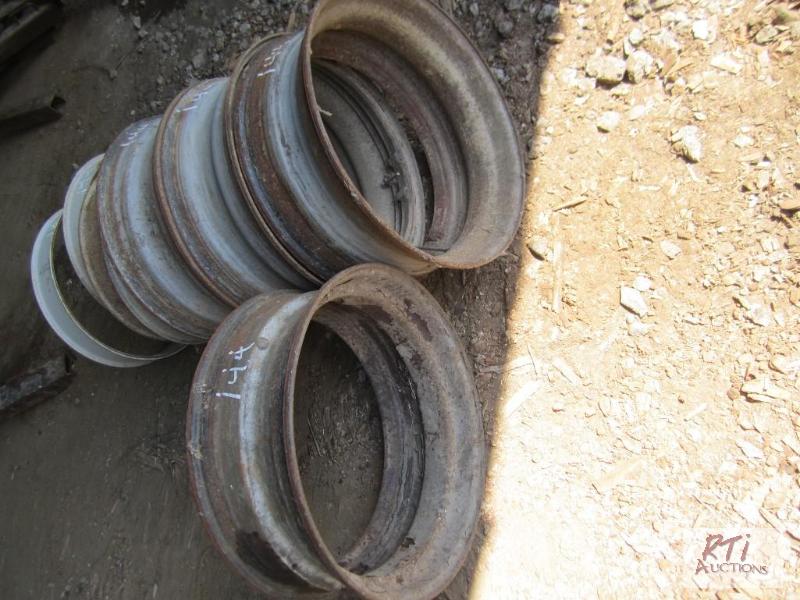 lot 144 image: (4) Open style rims and spacers...