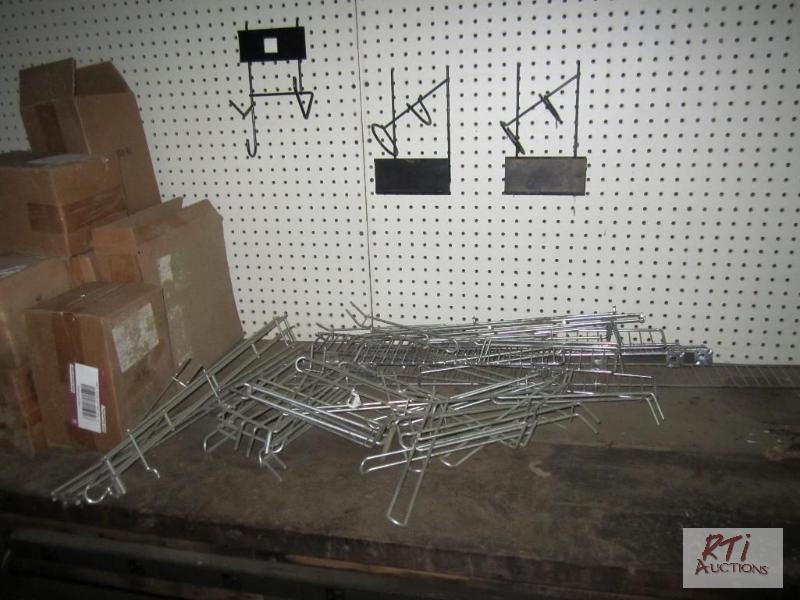 lot 76A image: (6) sheets of pegboard wseveral boxes of han...