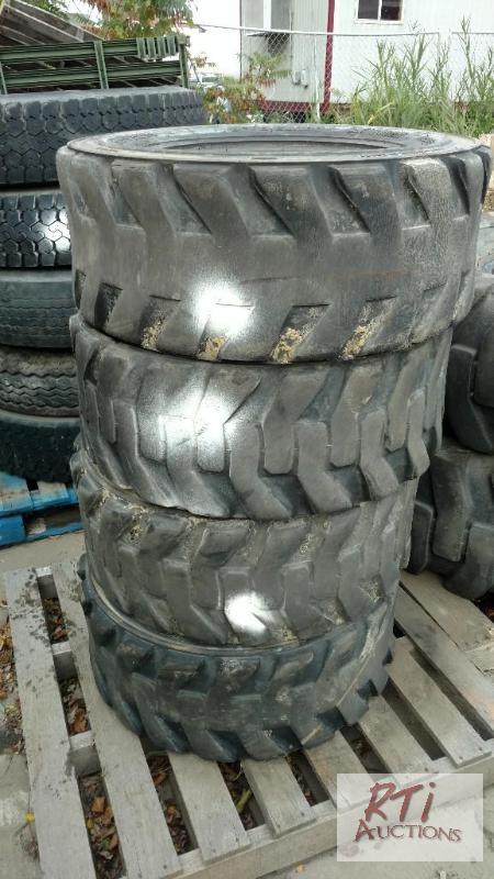 lot 33 image: (4) Tires 12-16.5 NHS 12 Ply Tubeless SS Load...