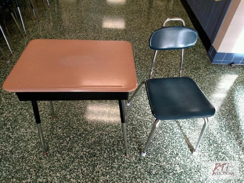 lot 105 image: (14) medium size desks, (14) blue chairs. All...