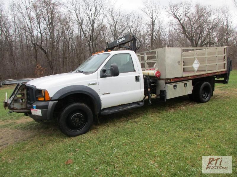 lot 24 image: 2006 Ford F550 flatbed truck with crane, dies...