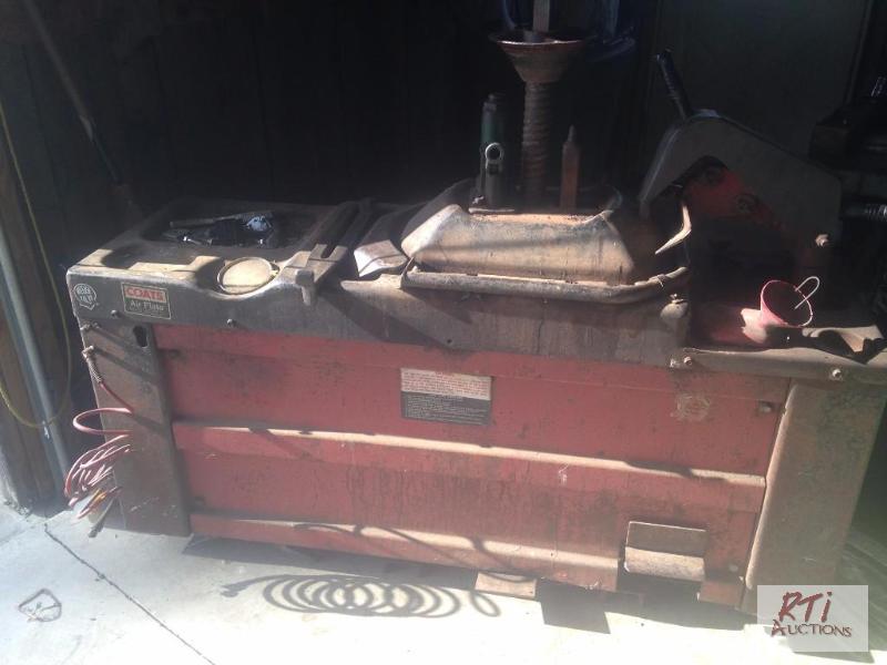 lot 78 image: Coats Tire Change Machine. Unit is located in...