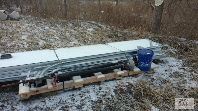 lot 103 image: 10x12 overhead door uses a chain fall to open...